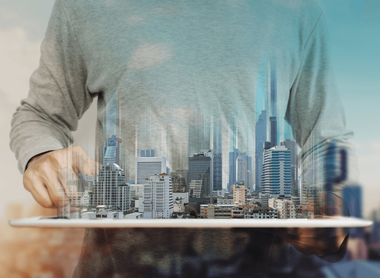 a man holding a tray with buildings on it representing a smart building ecosystem